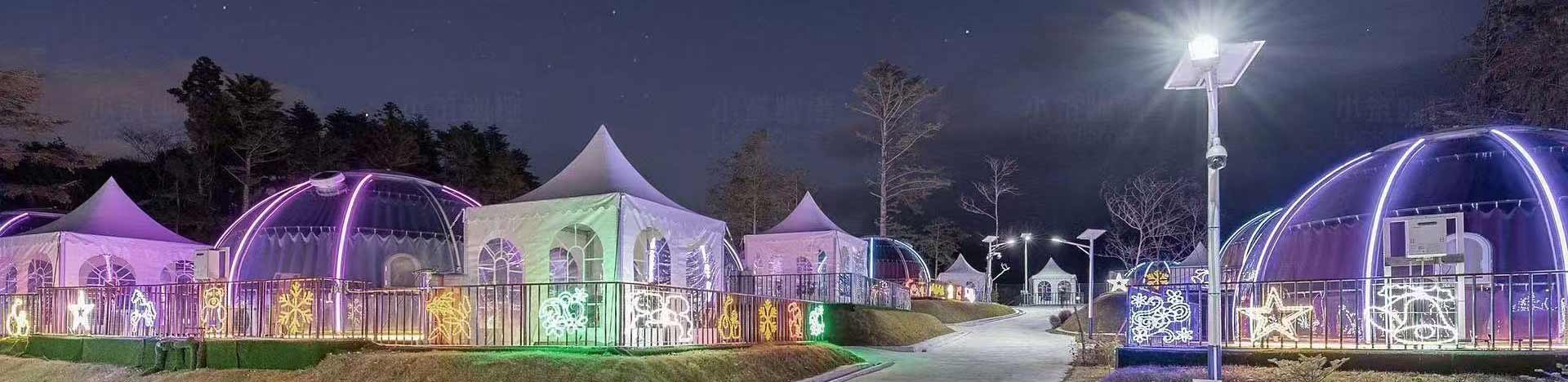 Colorful polycarbonate stargazing dome glowing at night, ideal for architectural project banners